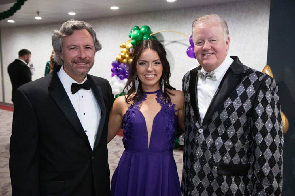 Doug Rehm, Ruthie Noel and Steve Moorhead at the 2026 Krewe of Priscus Coachella in Pensacola, Florida