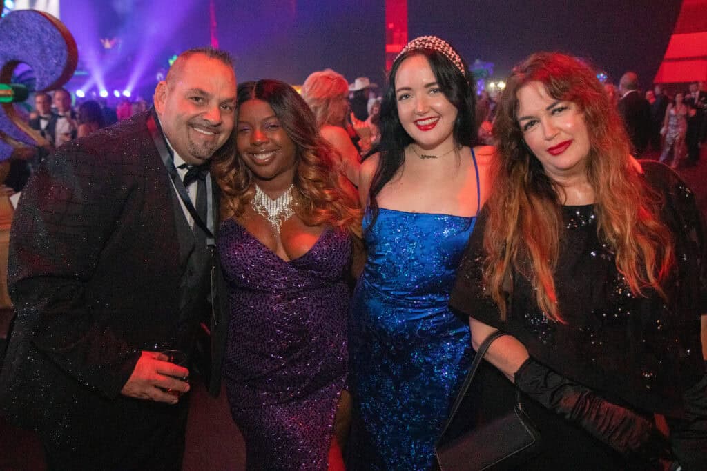 Janie Hoyes, Brian Williams, Linda Brown, and Falloon Brown at the 2026 Krewe of Priscus Coachella in Pensacola, Florida