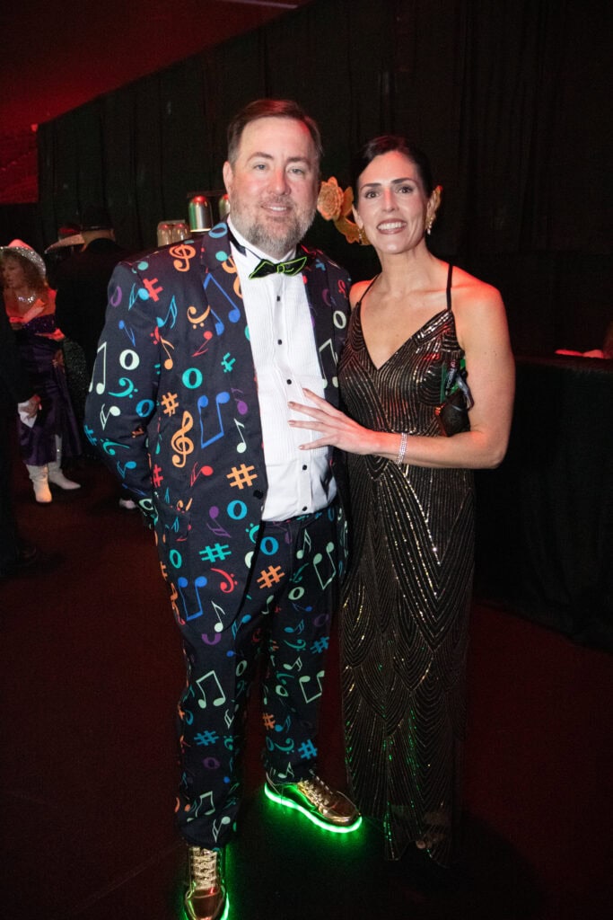 Justin and Jessica Edmonds at the 2026 Krewe of Priscus Coachella in Pensacola, Florida