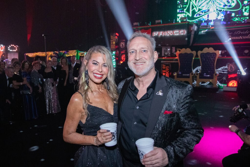 Merideth Knowlton and Daniel Elliot at the 2026 Krewe of Priscus Coachella in Pensacola, Florida