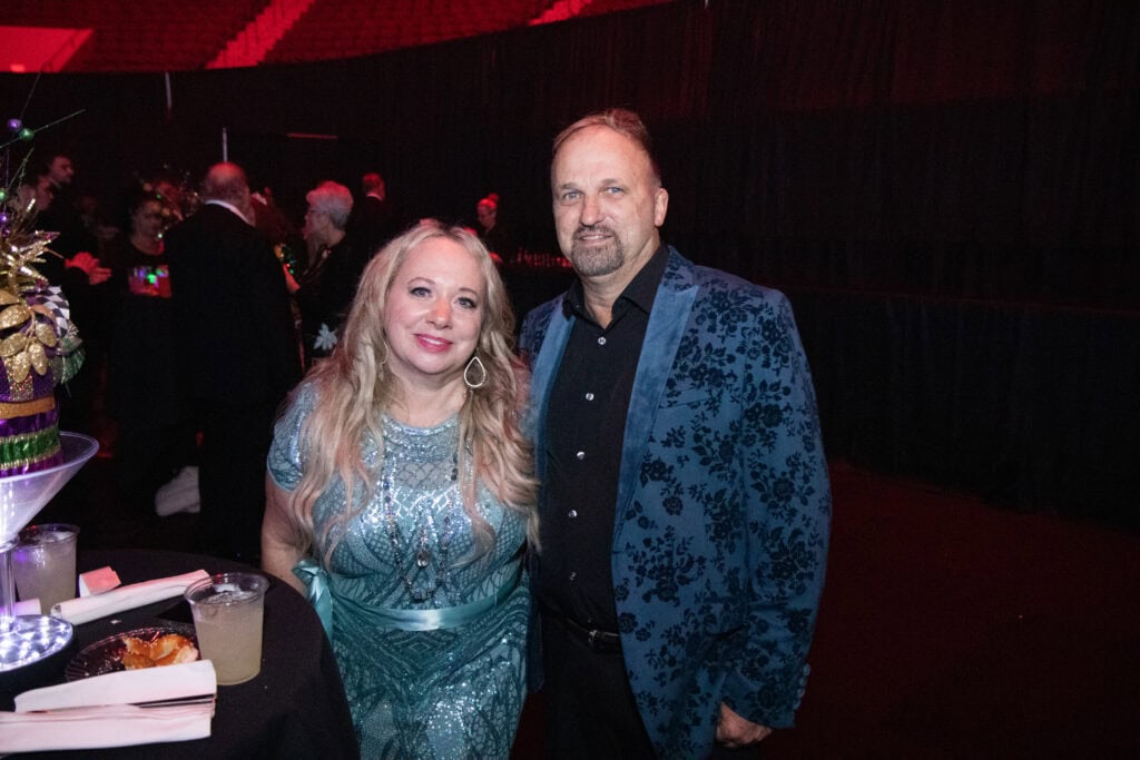 Mike and Michella Rewenko at the 2026 Krewe of Priscus Coachella in Pensacola, Florida