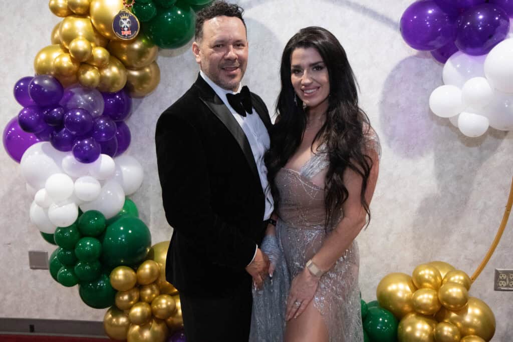 Victor and Melanie Luna at the 2026 Krewe of Priscus Coachella in Pensacola, Florida