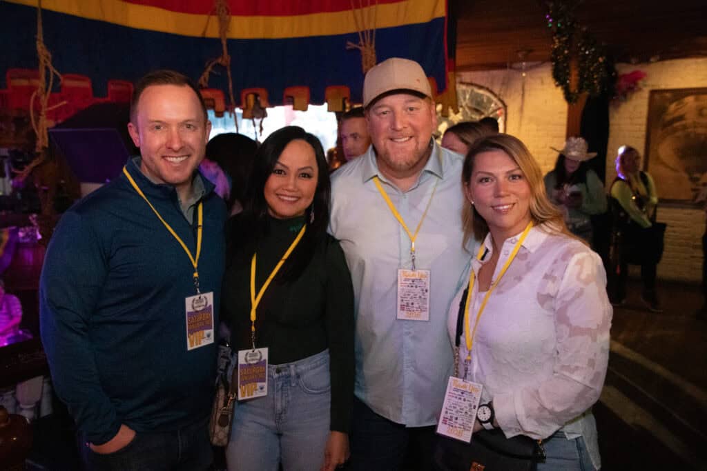 Bobby and Hong Potomski, Greg Harris and Sanri Blignaut at the 2026 Mardi Gras Kick-off in the Seville Quarter of Pensacola, Florida