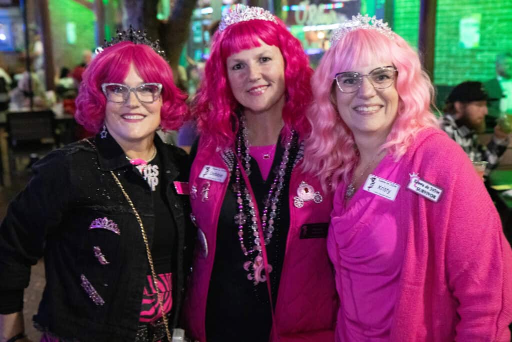 Cindy Zazueta, Debbie Lawrence and Kristy Peacock at the 2026 Mardi Gras Kick-off in the Seville Quarter of Pensacola, Florida