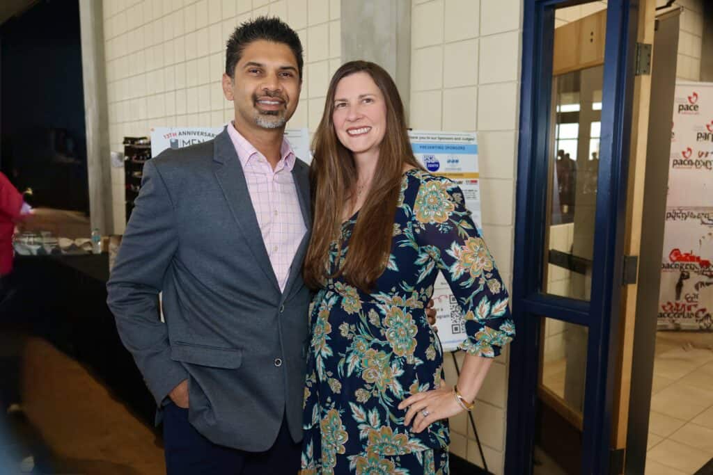 Nisarg & Katie Parikh at the 2026 Men Who Cook in Pensacola, Florida.